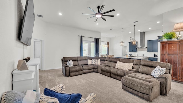 1146 Enclave Ct, Auburndale, FL 33823 - living room with light colored carpet, recessed lighting, ceiling fan, and baseboards