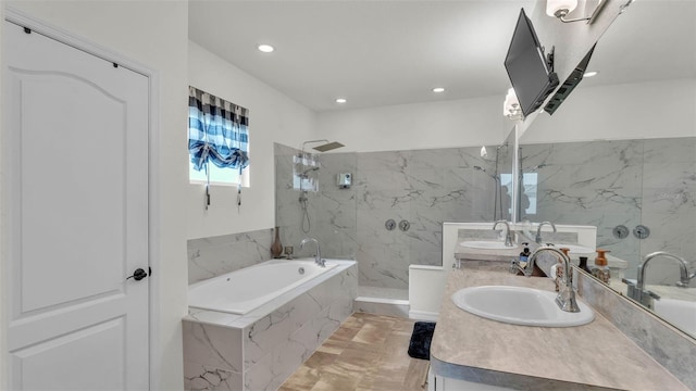 1146 Enclave Ct, Auburndale, FL 33823 - bathroom with marble look tiles, double vanity, a bath, a marble finish shower, and recessed lighting