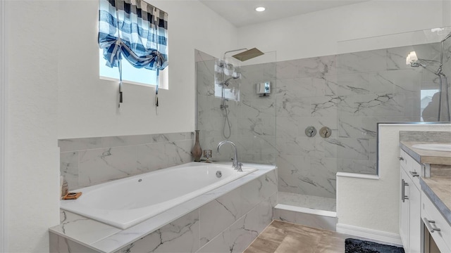 1146 Enclave Ct, Auburndale, FL 33823 - full bathroom featuring vanity, a bath, and a marble finish shower