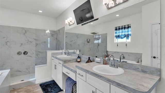 1146 Enclave Ct, Auburndale, FL 33823 - bathroom featuring double vanity, a marble finish shower, and recessed lighting