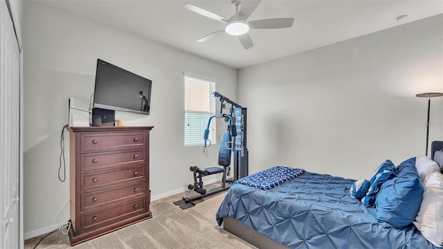 1146 Enclave Ct, Auburndale, FL 33823 - bedroom featuring baseboards, light colored carpet, and a ceiling fan