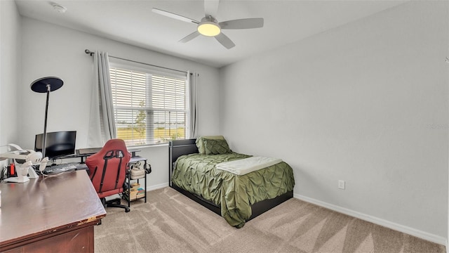1146 Enclave Ct, Auburndale, FL 33823 - carpeted bedroom featuring a desk, baseboards, and a ceiling fan