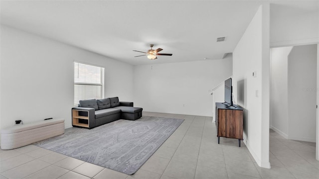 2546 Red Egret Dr, Bartow, FL 33830 - living area with ceiling fan and light tile patterned flooring