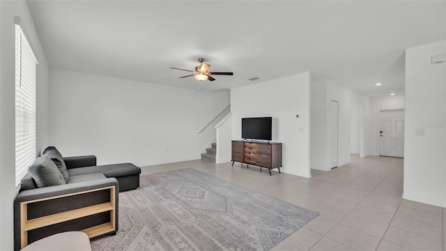 2546 Red Egret Dr, Bartow, FL 33830 - living area with stairway, tile patterned floors, ceiling fan, and recessed lighting