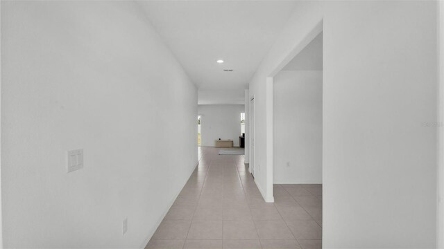 2546 Red Egret Dr, Bartow, FL 33830 - hall featuring light tile patterned floors, recessed lighting, and baseboards