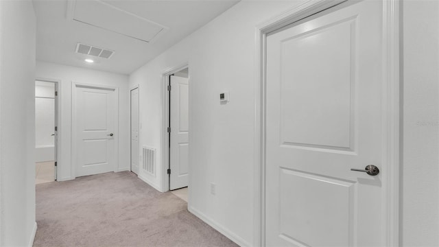 2546 Red Egret Dr, Bartow, FL 33830 - hallway featuring light carpet, baseboards, and recessed lighting