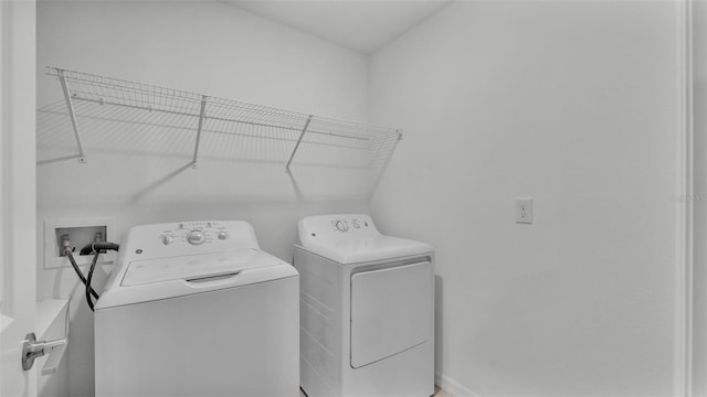 2546 Red Egret Dr, Bartow, FL 33830 - washroom with washing machine and clothes dryer and baseboards