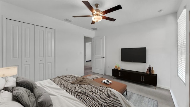 2546 Red Egret Dr, Bartow, FL 33830 - carpeted bedroom with baseboards, a closet, and a ceiling fan