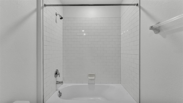 2546 Red Egret Dr, Bartow, FL 33830 - full bathroom with  shower combination, toilet, and a textured wall