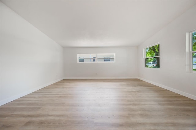 3813 Surrey Dr, Orlando, FL 32812 - empty room with light wood-style floors and baseboards