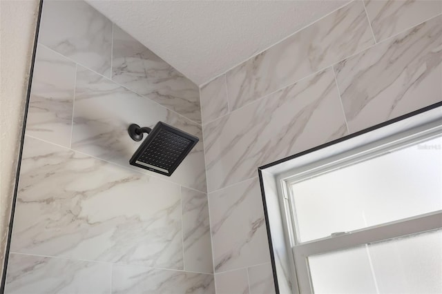 3813 Surrey Dr, Orlando, FL 32812 - bathroom view of a marble finish shower and a textured ceiling