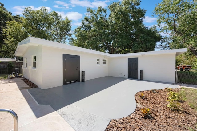 3813 Surrey Dr, Orlando, FL 32812 - rear view of property featuring a patio