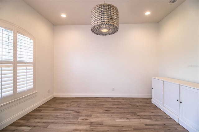3176 Pearly Dr, Lakeland, FL 33812 - spare room featuring wood finished floors, recessed lighting, and baseboards