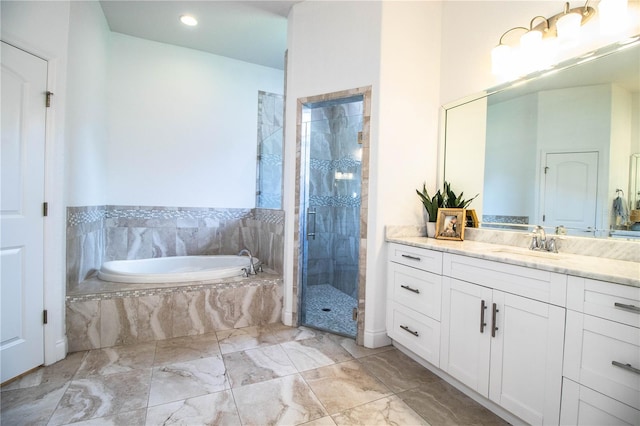 3176 Pearly Dr, Lakeland, FL 33812 - bathroom featuring vanity, a garden tub, a shower stall, and marble finish floors