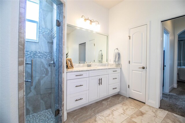 3176 Pearly Dr, Lakeland, FL 33812 - full bathroom with vanity, a shower stall, and marble finish flooring