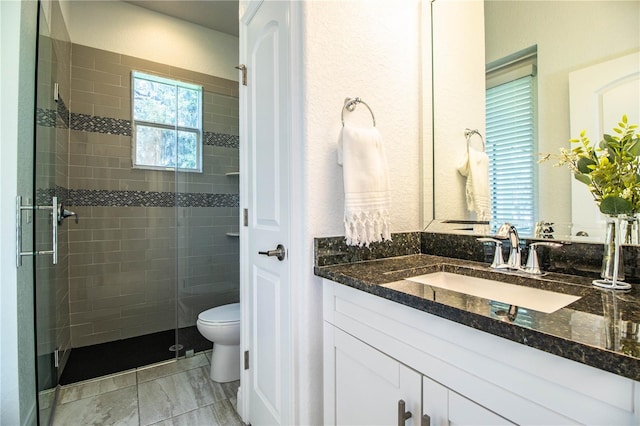 3176 Pearly Dr, Lakeland, FL 33812 - bathroom with a shower stall, vanity, and toilet