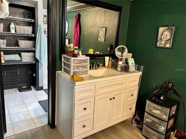 103 Inglis Way, Wauchula, FL 33873 - bathroom with vanity and wood finished floors