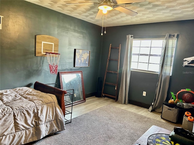 103 Inglis Way, Wauchula, FL 33873 - bedroom featuring wood finished floors, baseboards, and a ceiling fan