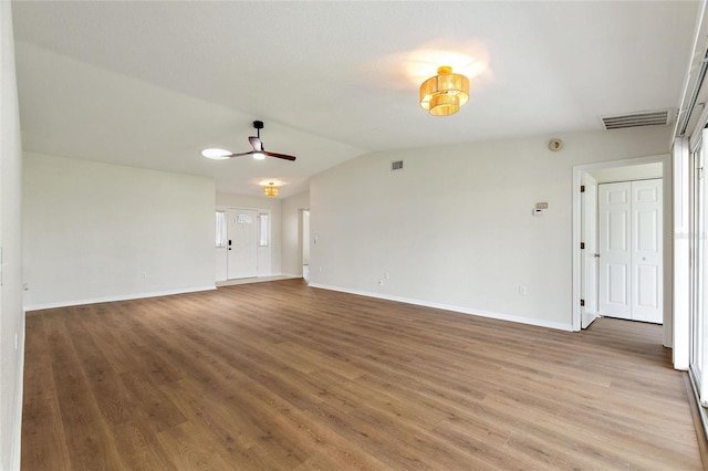 3618 Highland Fairways Blvd, Lakeland, FL 33810 - spare room with baseboards, vaulted ceiling, light wood-style flooring, and a ceiling fan