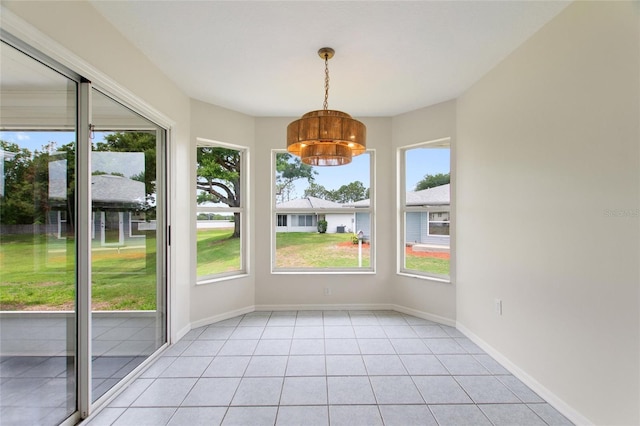3618 Highland Fairways Blvd, Lakeland, FL 33810 - unfurnished dining area with plenty of natural light, a chandelier, and baseboards