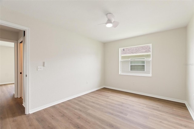 3618 Highland Fairways Blvd, Lakeland, FL 33810 - unfurnished room featuring light wood-style flooring, ceiling fan, and baseboards
