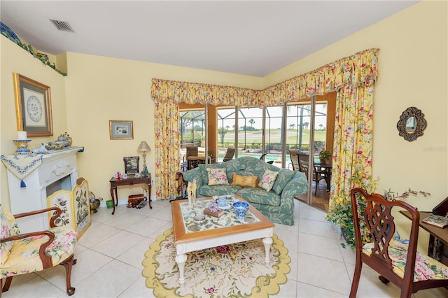 2936 Grasslands Dr, Lakeland, FL 33803 - living area with a sunroom and light tile patterned floors