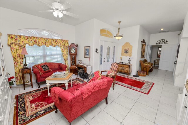 2936 Grasslands Dr, Lakeland, FL 33803 - living area with light tile patterned flooring and ceiling fan