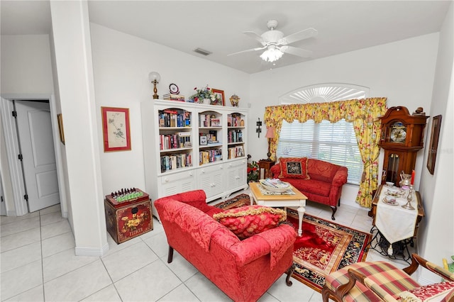 2936 Grasslands Dr, Lakeland, FL 33803 - living area with light tile patterned flooring and ceiling fan