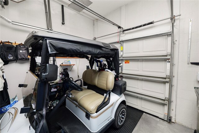 2936 Grasslands Dr, Lakeland, FL 33803 - garage featuring concrete block wall