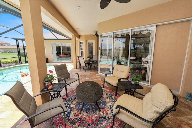 2936 Grasslands Dr, Lakeland, FL 33803 - view of patio / terrace with a ceiling fan, an outdoor pool, and glass enclosure