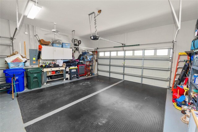 2936 Grasslands Dr, Lakeland, FL 33803 - garage featuring electric panel, a garage door opener, and a ceiling fan