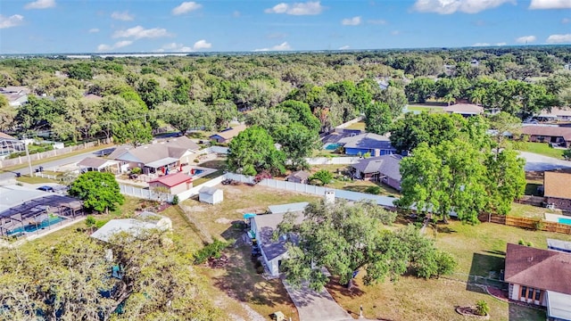 1423 Ridgegreen Loop N, Lakeland, FL 33809 - aerial view of residential area featuring a forest