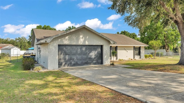 1423 Ridgegreen Loop N, Lakeland, FL 33809 - single story home featuring a garage, concrete driveway, and roof with shingles