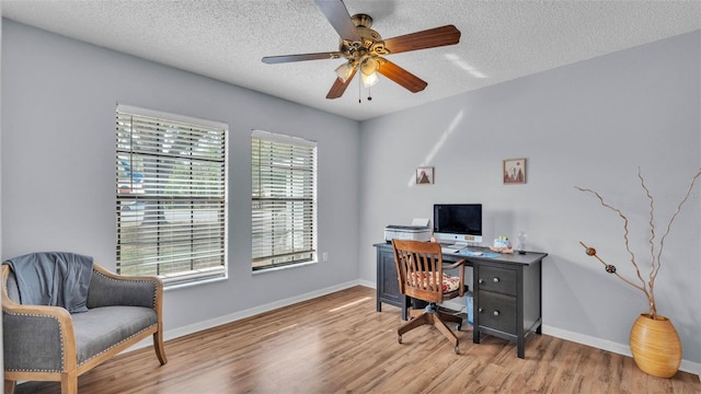 1423 Ridgegreen Loop N, Lakeland, FL 33809 - office area with wood finished floors, ceiling fan, a textured ceiling, and baseboards