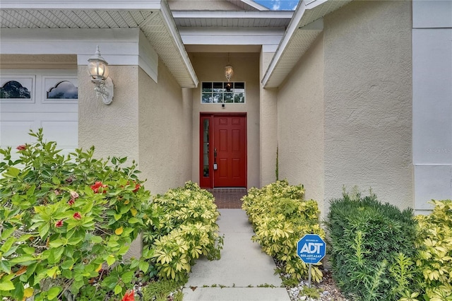 1003 Clearpointe Way, Lakeland, FL 33813 - doorway to property with stucco siding