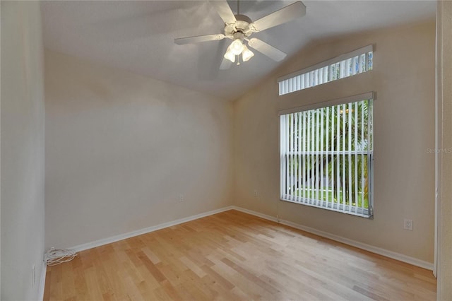 1003 Clearpointe Way, Lakeland, FL 33813 - empty room featuring wood finished floors, lofted ceiling, baseboards, and a ceiling fan