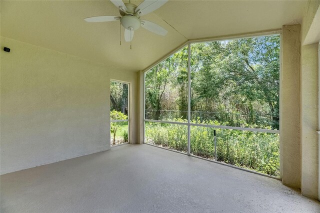 1003 Clearpointe Way, Lakeland, FL 33813 - unfurnished sunroom featuring vaulted ceiling and plenty of natural light