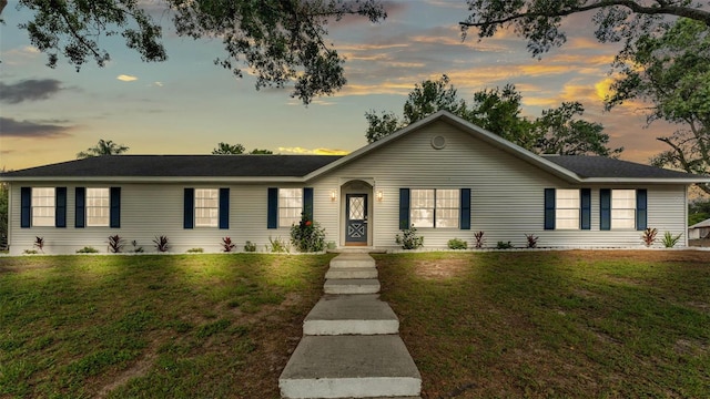 4825 Foxrun, Lakeland, FL 33813 - ranch-style home featuring a front lawn