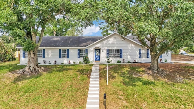 4825 Foxrun, Lakeland, FL 33813 - single story home featuring a front lawn