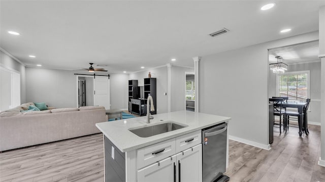 4825 Foxrun, Lakeland, FL 33813 - kitchen featuring a sink, dishwasher, open floor plan, recessed lighting, and light wood finished floors