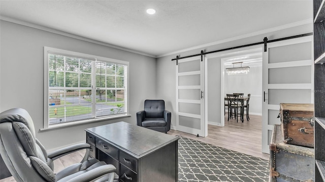 4825 Foxrun, Lakeland, FL 33813 - office with a barn door, crown molding, dark wood-type flooring, and baseboards