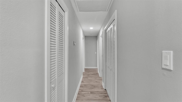 4825 Foxrun, Lakeland, FL 33813 - hall featuring wood finished floors and baseboards