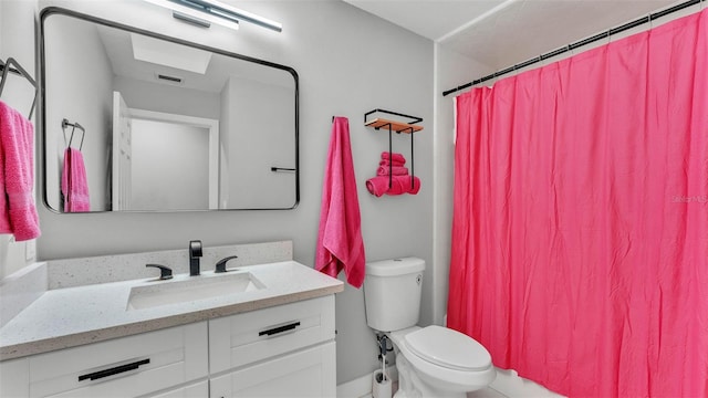 4825 Foxrun, Lakeland, FL 33813 - full bath with vanity, toilet, and a shower with shower curtain