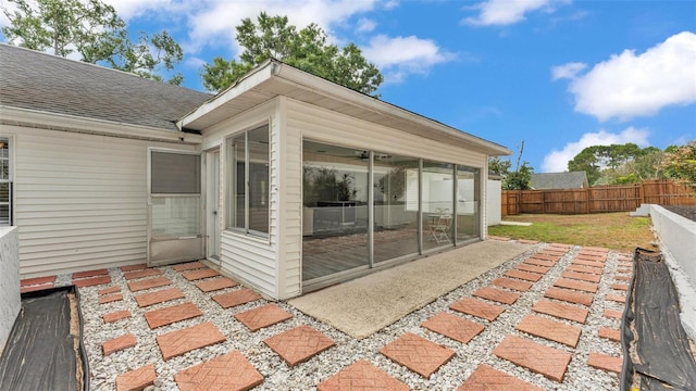 4825 Foxrun, Lakeland, FL 33813 - view of patio with a sunroom