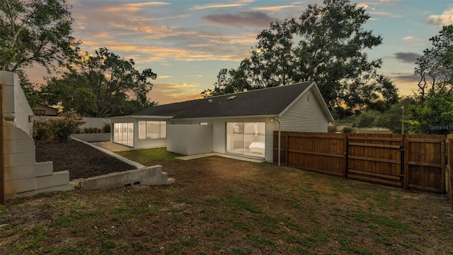 4825 Foxrun, Lakeland, FL 33813 - view of back of house at dusk