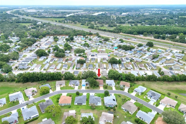 6065 Magpie Dr, Lakeland, FL 33809 - aerial view of property and surrounding area featuring nearby suburban area