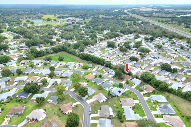 6065 Magpie Dr, Lakeland, FL 33809 - aerial overview of property's location featuring a large body of water and nearby suburban area