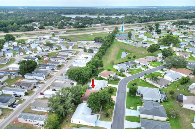 6065 Magpie Dr, Lakeland, FL 33809 - aerial view of property and surrounding area with nearby suburban area and a nearby body of water