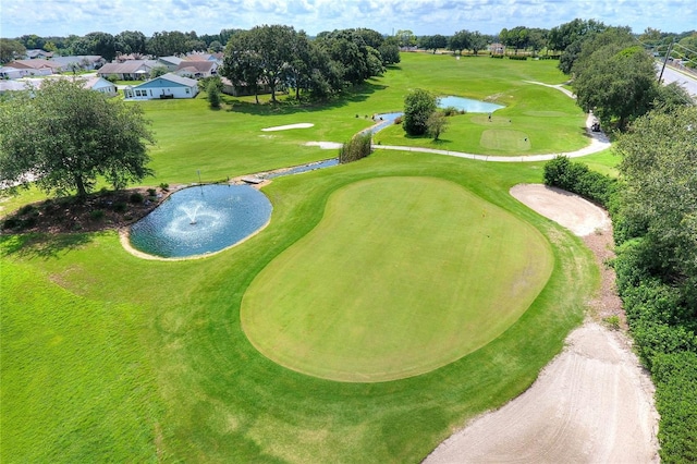 6065 Magpie Dr, Lakeland, FL 33809 - drone / aerial view of a large body of water, a golf course, and a tree filled landscape