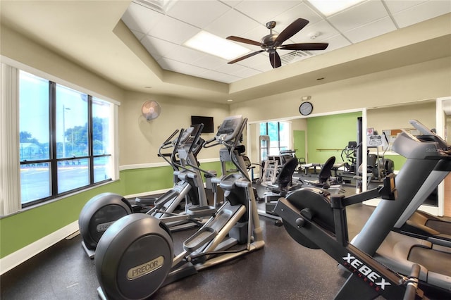 6065 Magpie Dr, Lakeland, FL 33809 - exercise room with ceiling fan, a paneled ceiling, a raised ceiling, and baseboards